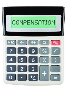 A calculator that reads 'compensation' on its screen to represent an MIB compensation calculator.