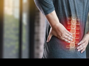 A person experiencing back pain.