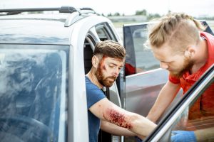 Man with injured elbow representing our guide on road accident compensation calculator