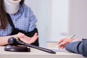 A client asks a solicitor about an eye injury claim calculator.