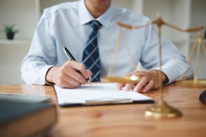 A solicitor who will help the client in using the elbow injury claim calculator.