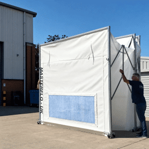 Fitter extending a ROLARE-FLEX + MOBE-X enclosure outdoors